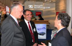Thought Technology VP Lawrence Klein with Dr. Peter Boehm and Leslie Reissner